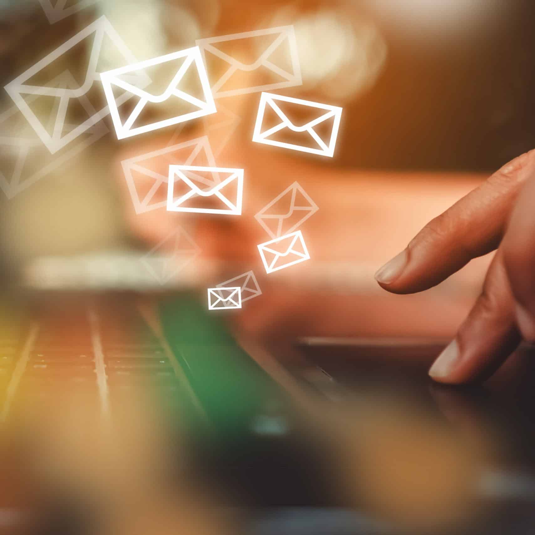 Woman hand using smartphone to send and recieve email.